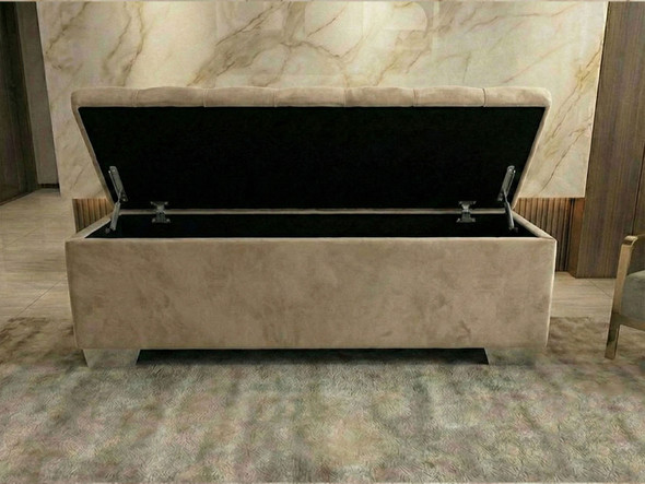 Open Brisa ottoman bench in beige velvet showing spacious internal storage for bedding and pillows